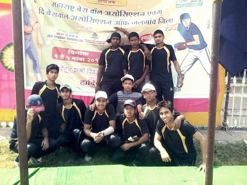 Ayush Rawat with his baseball team at a Maharashtra baseball event